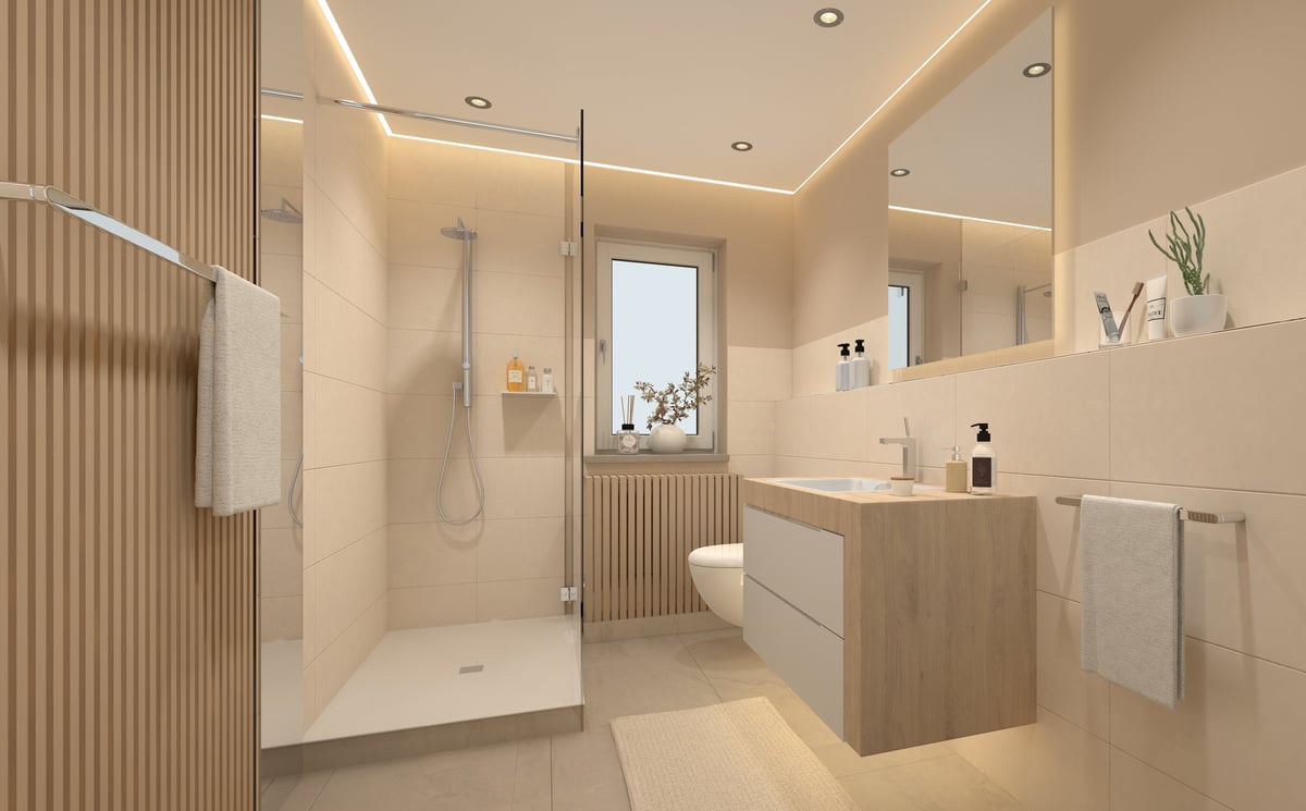 Modern bathroom with glass shower partition and natural light